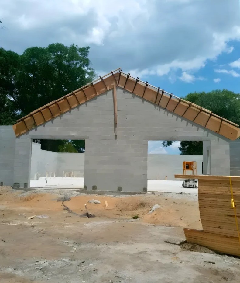 Concrete shell of a stone-frame building by DunRite, Florida